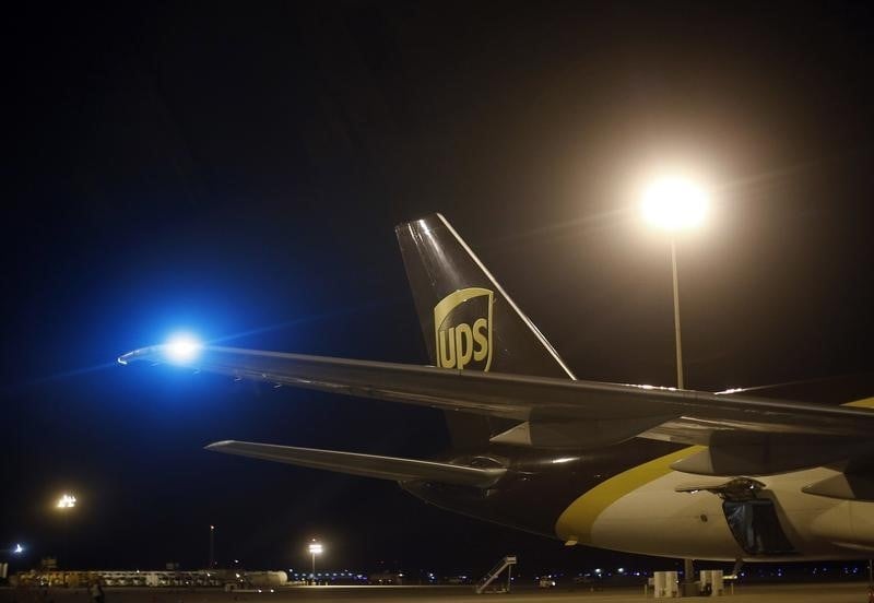 Le benefice net trimestriel d'ups en hausse de pres de 10%