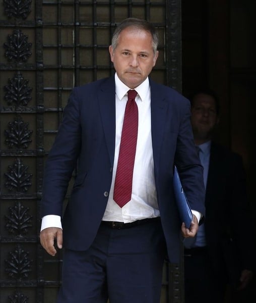 European central bank executive board member coeure leaves after a meeting with greece's prime minister samaras in athens