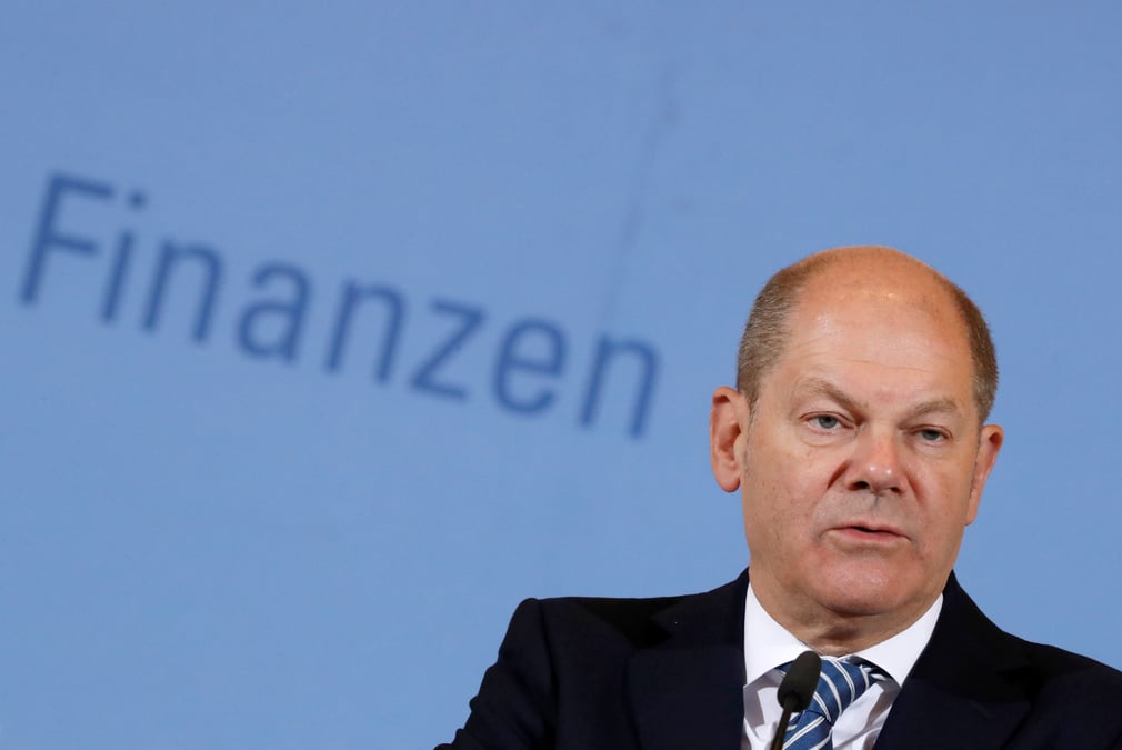 Scholz envisage d'etendre a d'autres actifs la taxe sur les transactions d'actions