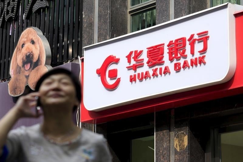 Deutsche bank vend sa participation de 20% dans hua xia bank