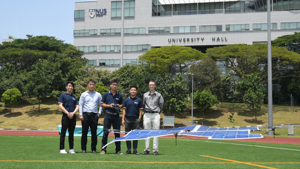 Students with solar-powered drone.