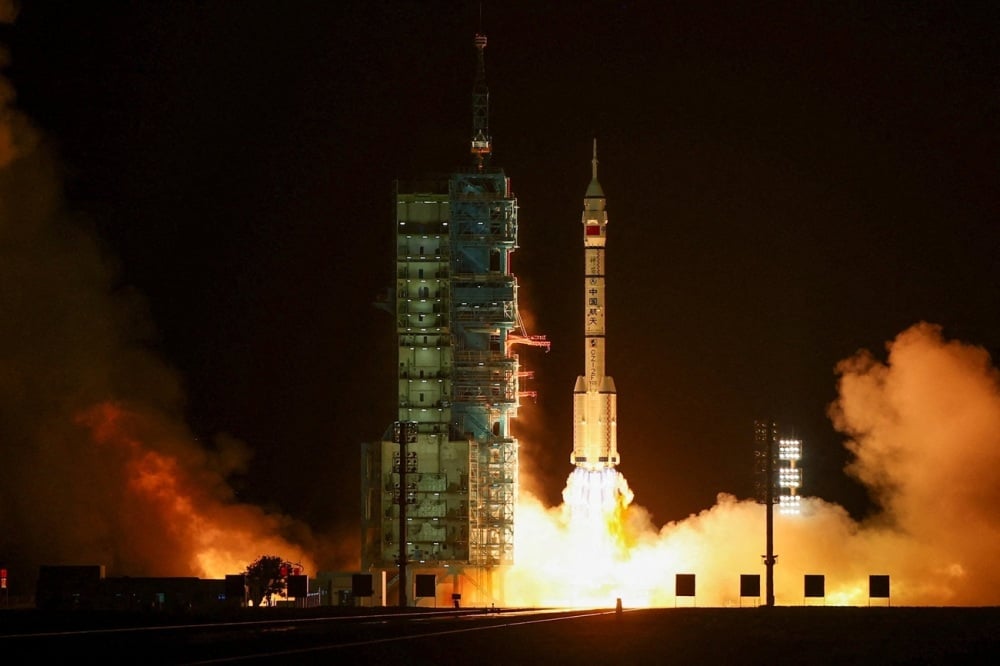 A Long March 2F rocket carrying the Shenzhou-23 spacecraft with astronauts Zhu Yangzhu, Zhang Zhiyuan, and Lai Ka-ying, who is the first astronaut from Hong Kong, blasts off to China's Tiangong space station from the launchpad at the Jiuquan Satellite...