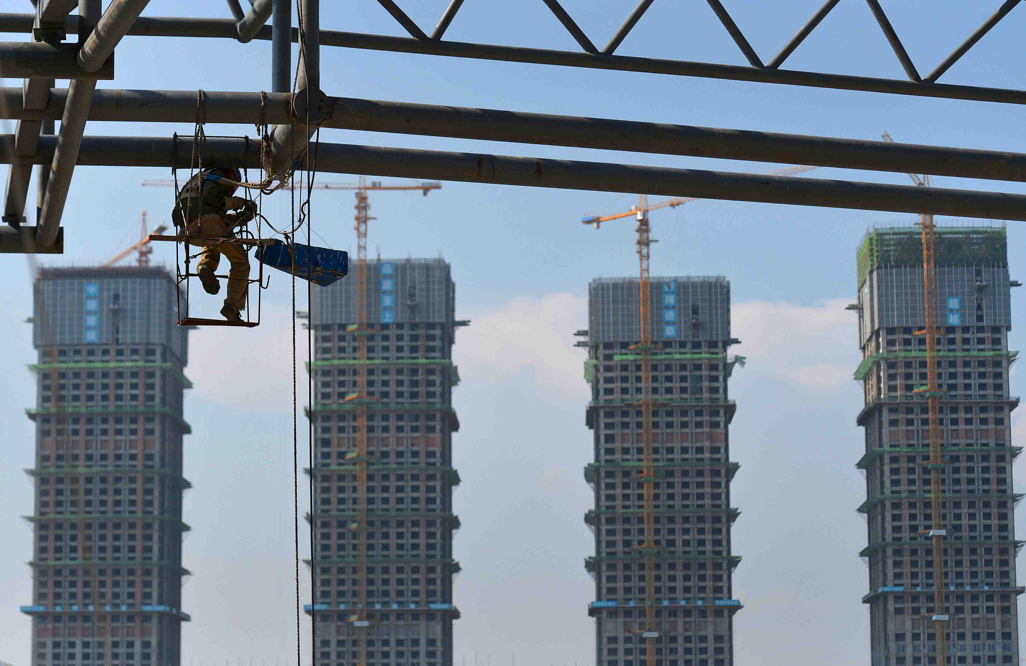 Les pressions negatives sur l'economie chinoise vont persister