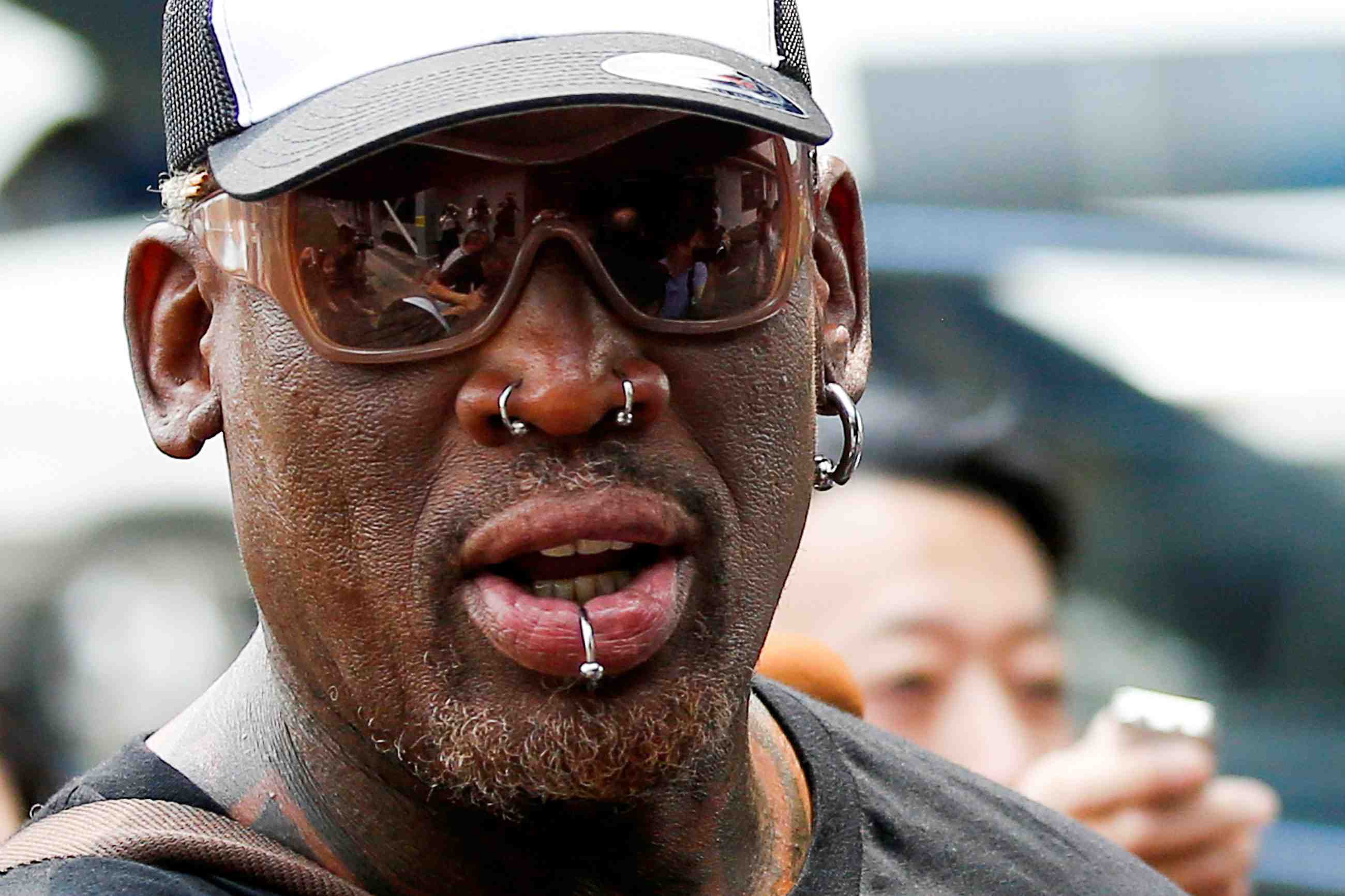 L'ex-basketteur dennis rodman a singapour pour le sommet trump-kim