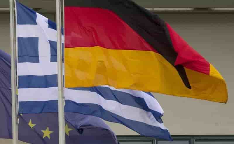 Angela merkel n'exclut pas de discuter amenagement de la dette grecque