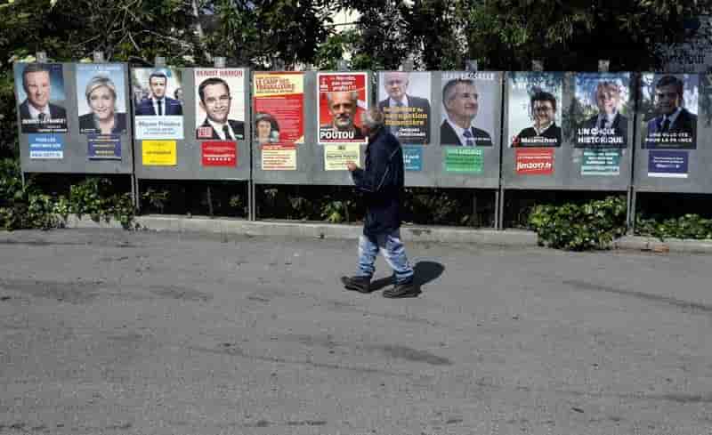 Macron et le pen gardent leurs poursuivants a distance