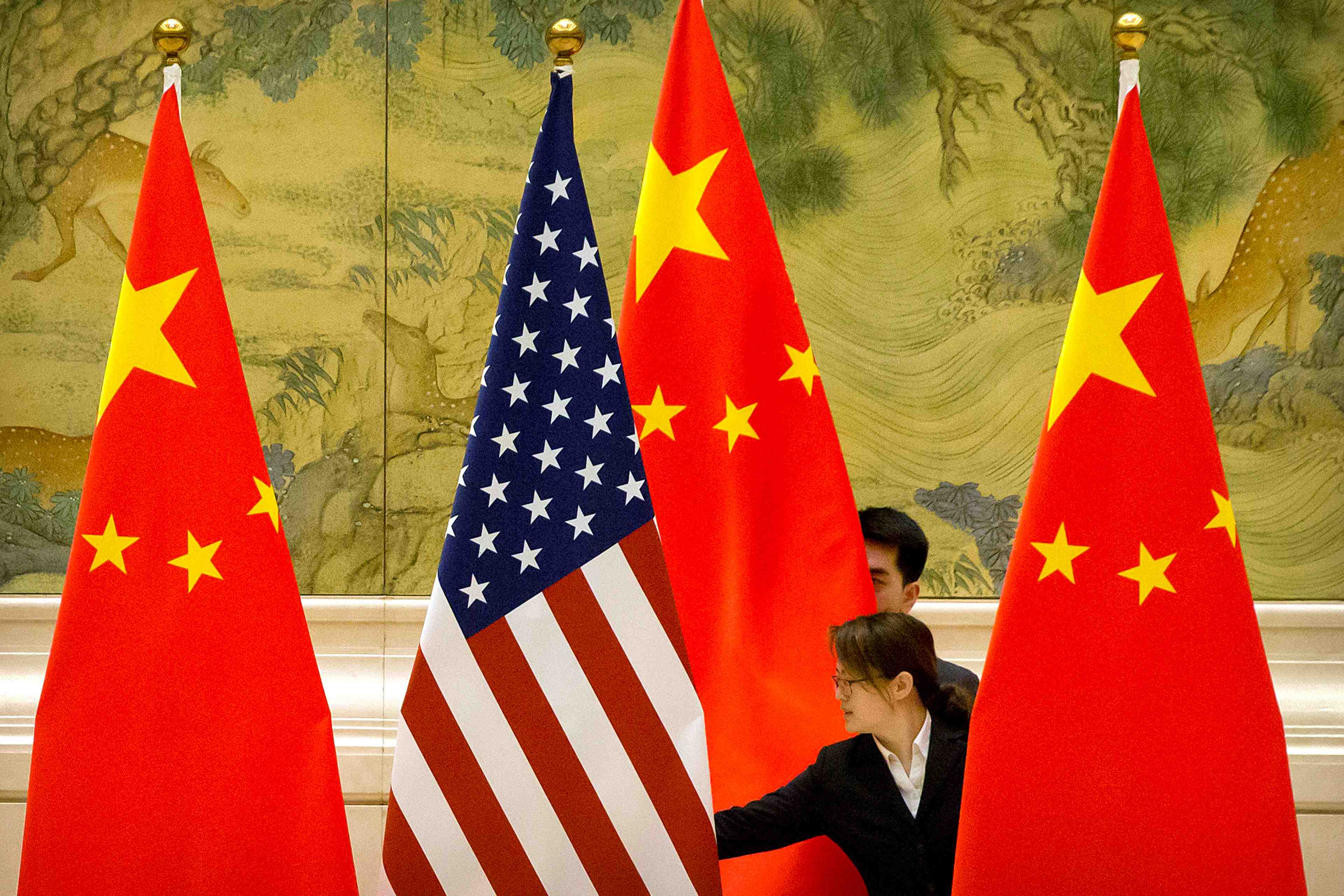 Usa et chine d'accord pour lever les taxes supplementaires, selon pekin
