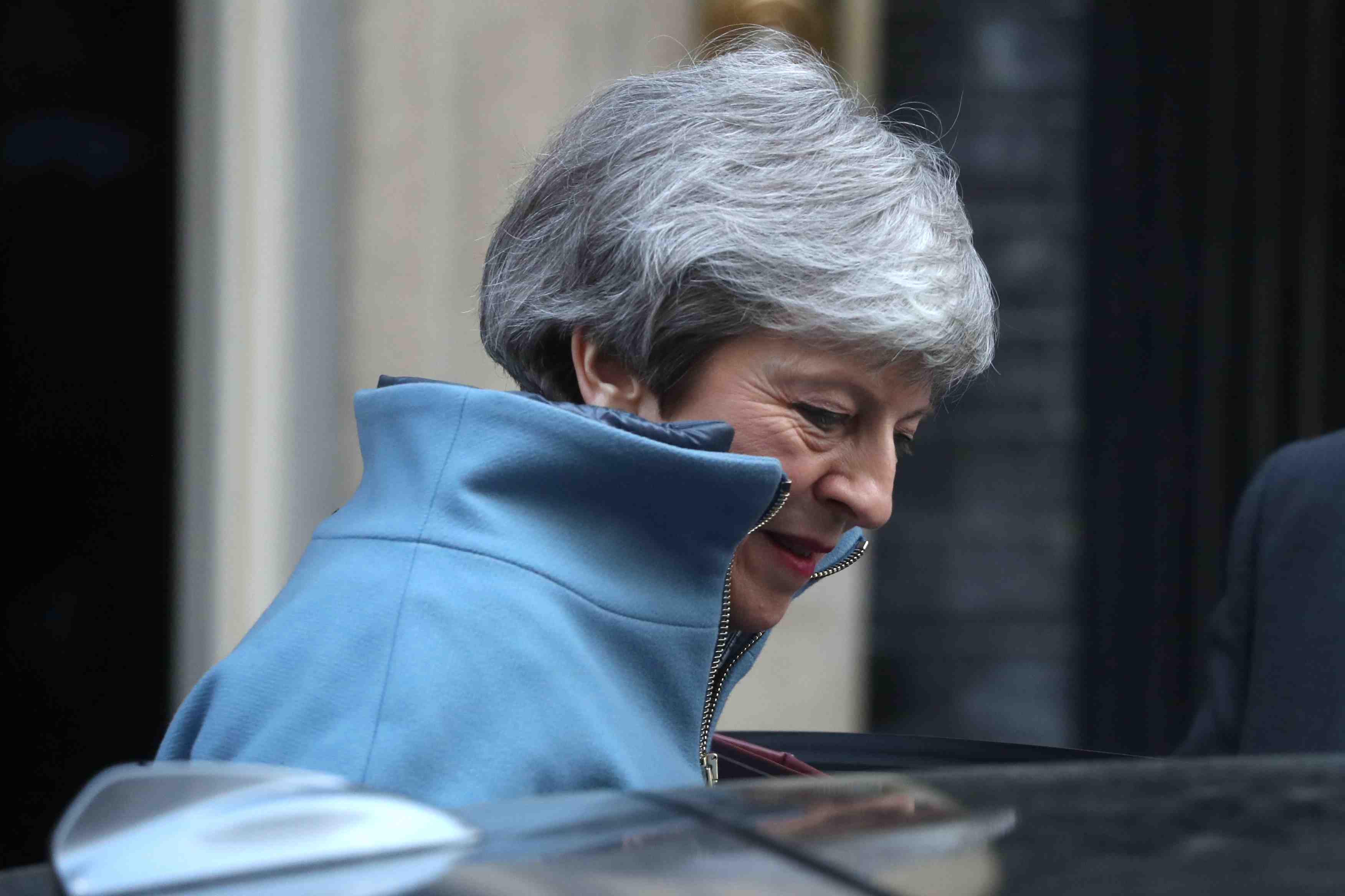May, en partance pour bruxelles, reaffirme sa volonte de modifier le "backstop"