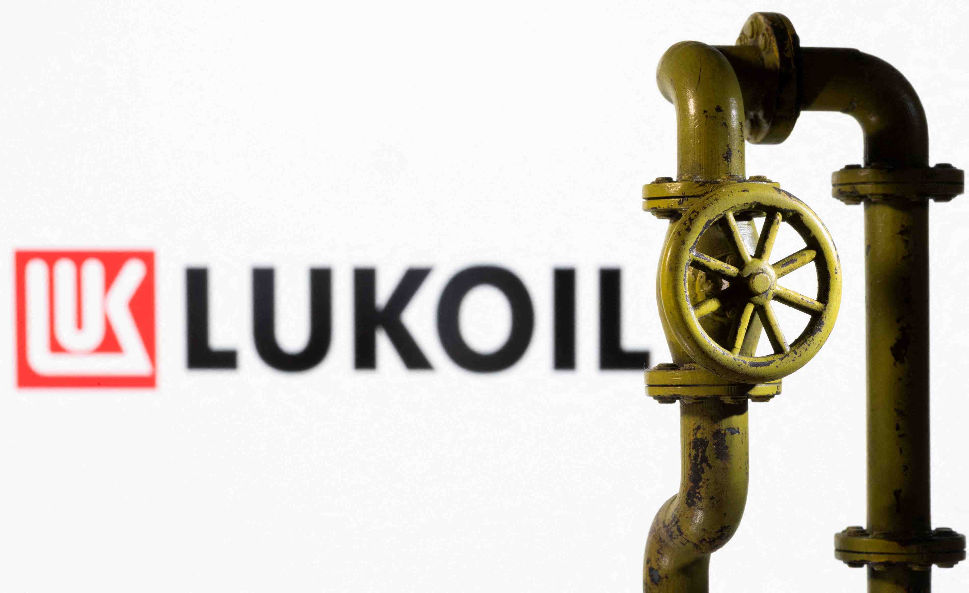 Illustration shows lukoil logo and natural gas pipeline