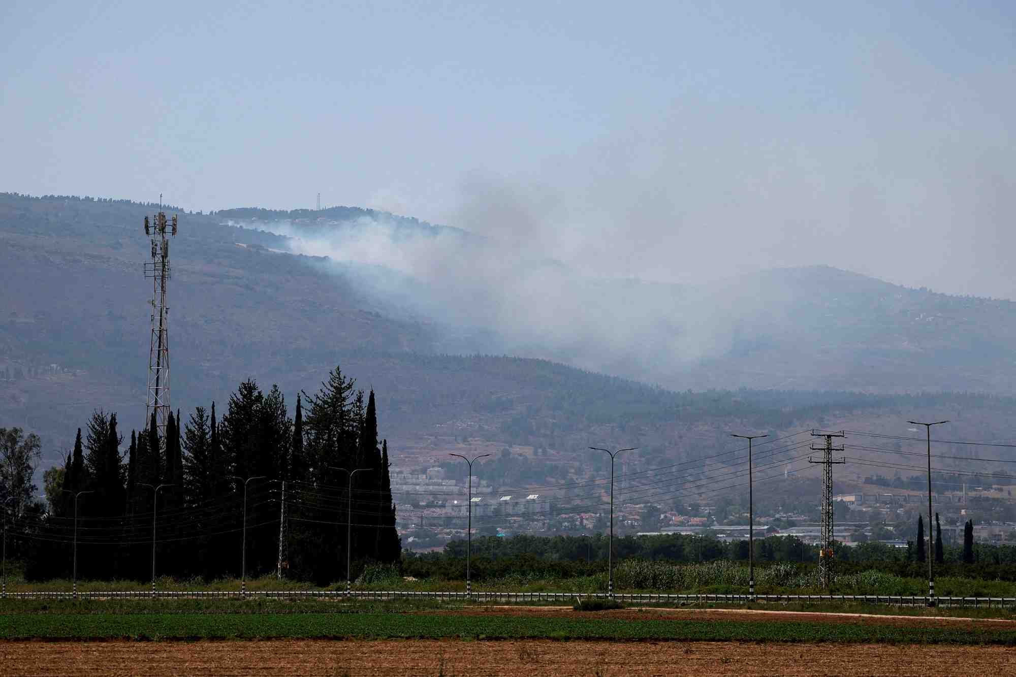 File photo: cross-border hostilities between hezbollah and israeli forces near kiryat shmona
