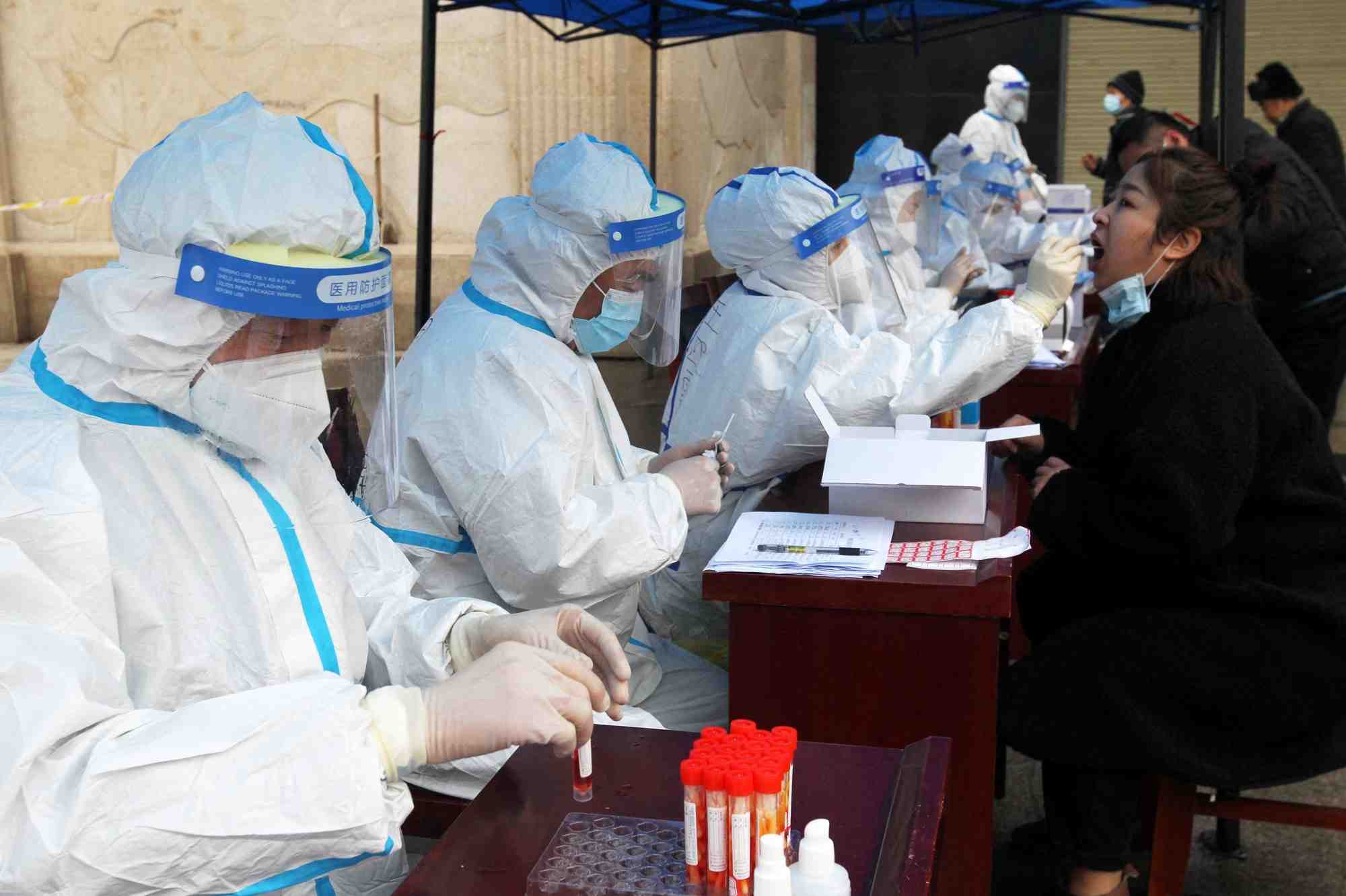 Coronavirus: en chine, les restrictions locales se multiplient