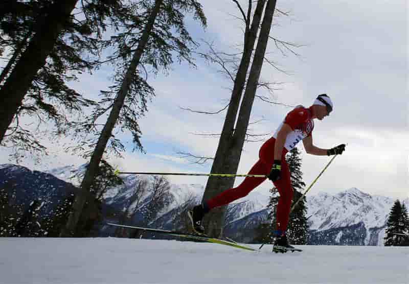JO: le Suisse Cologna s'offre un second titre en ski de fond