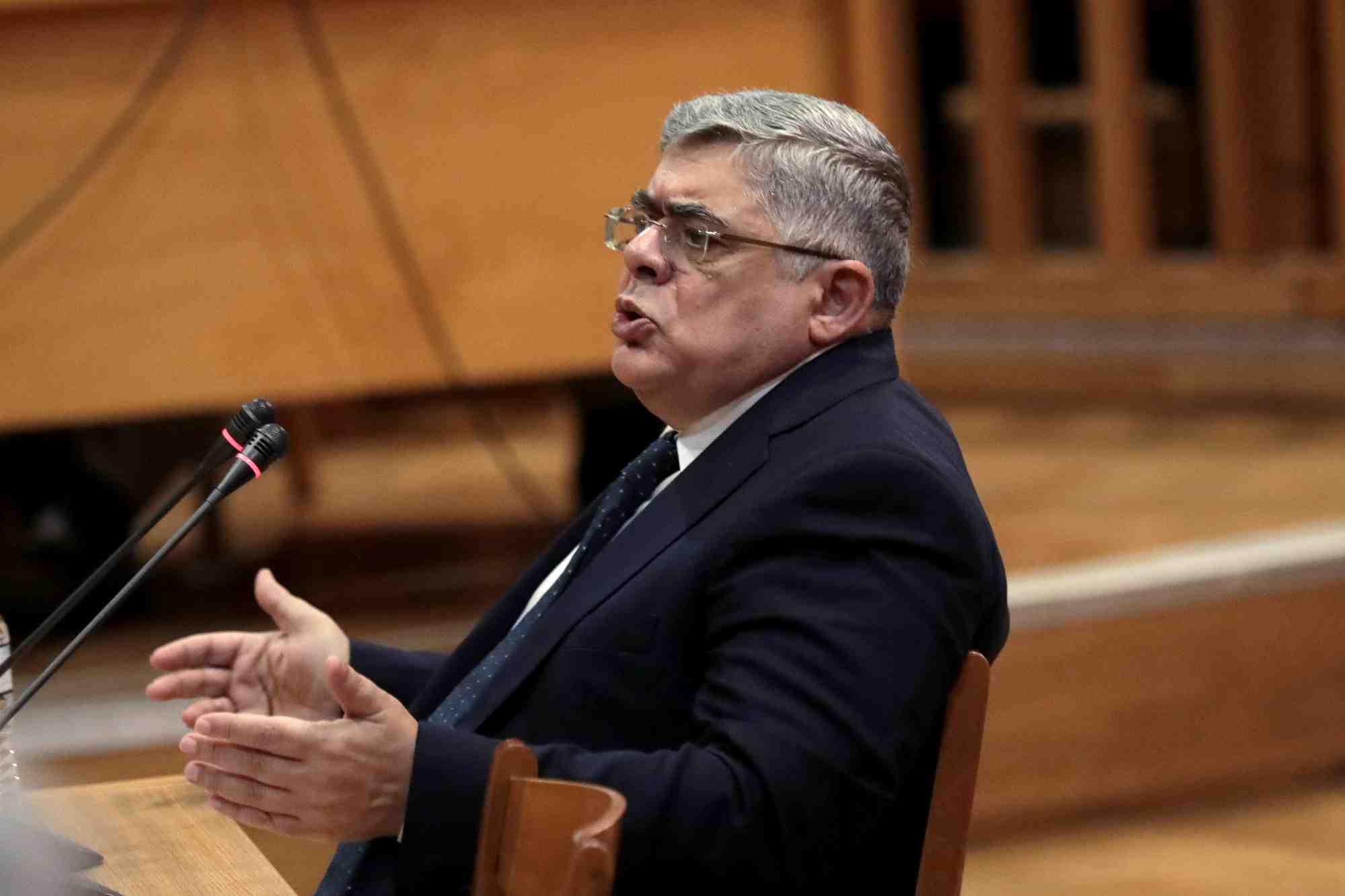 Le chef du parti d'extreme droite grec aube doree, nikos mihaloliakos, lors du proces de membres et de dirigeants du parti dans un tribunal d'athenes