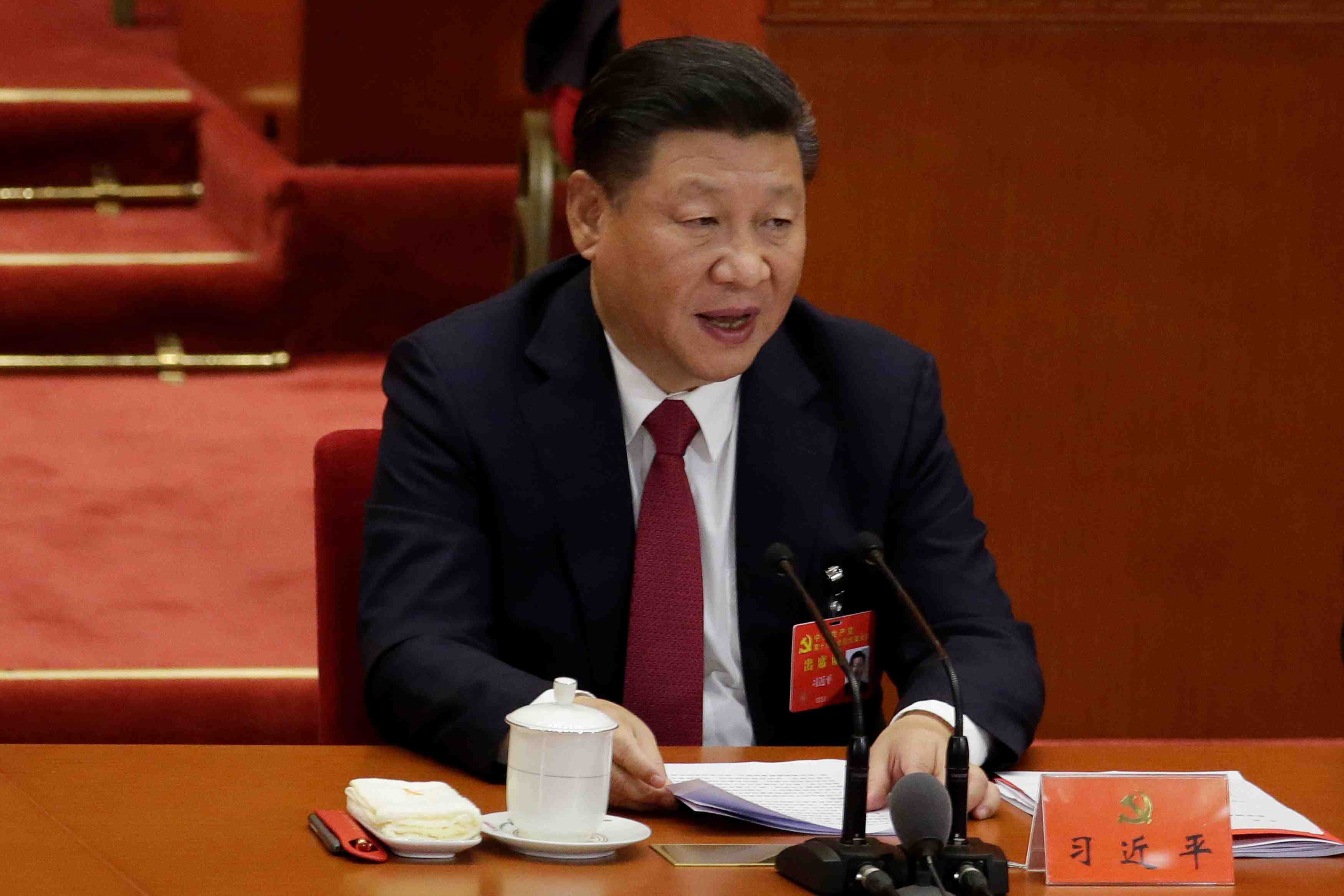 Chine: le nom de xi jinping inscrit dans la constitution du pcc