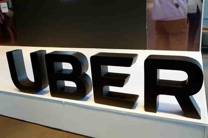 Uber reduit ses pertes et veut continuer a investir