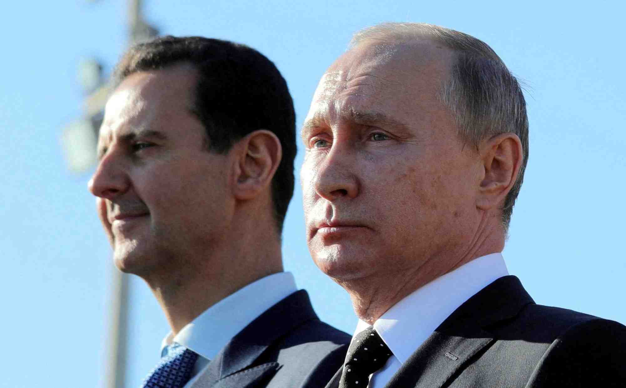 Le president russe vladimir poutine et l'ancien president syrien bachar al-assad