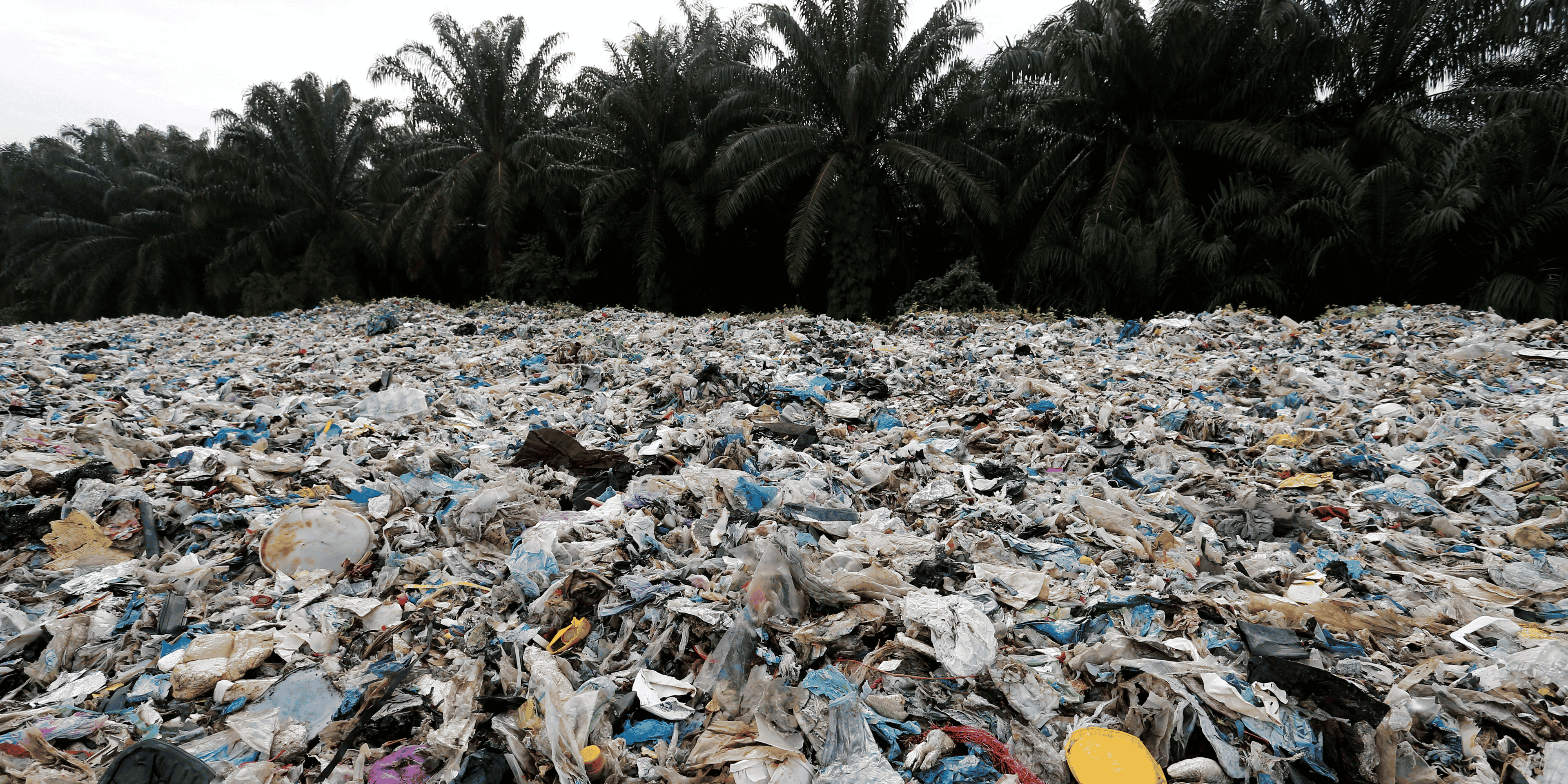 File photo: plastic waste is piled outside an illegal recycling factory in jenjarom, kuala langat
