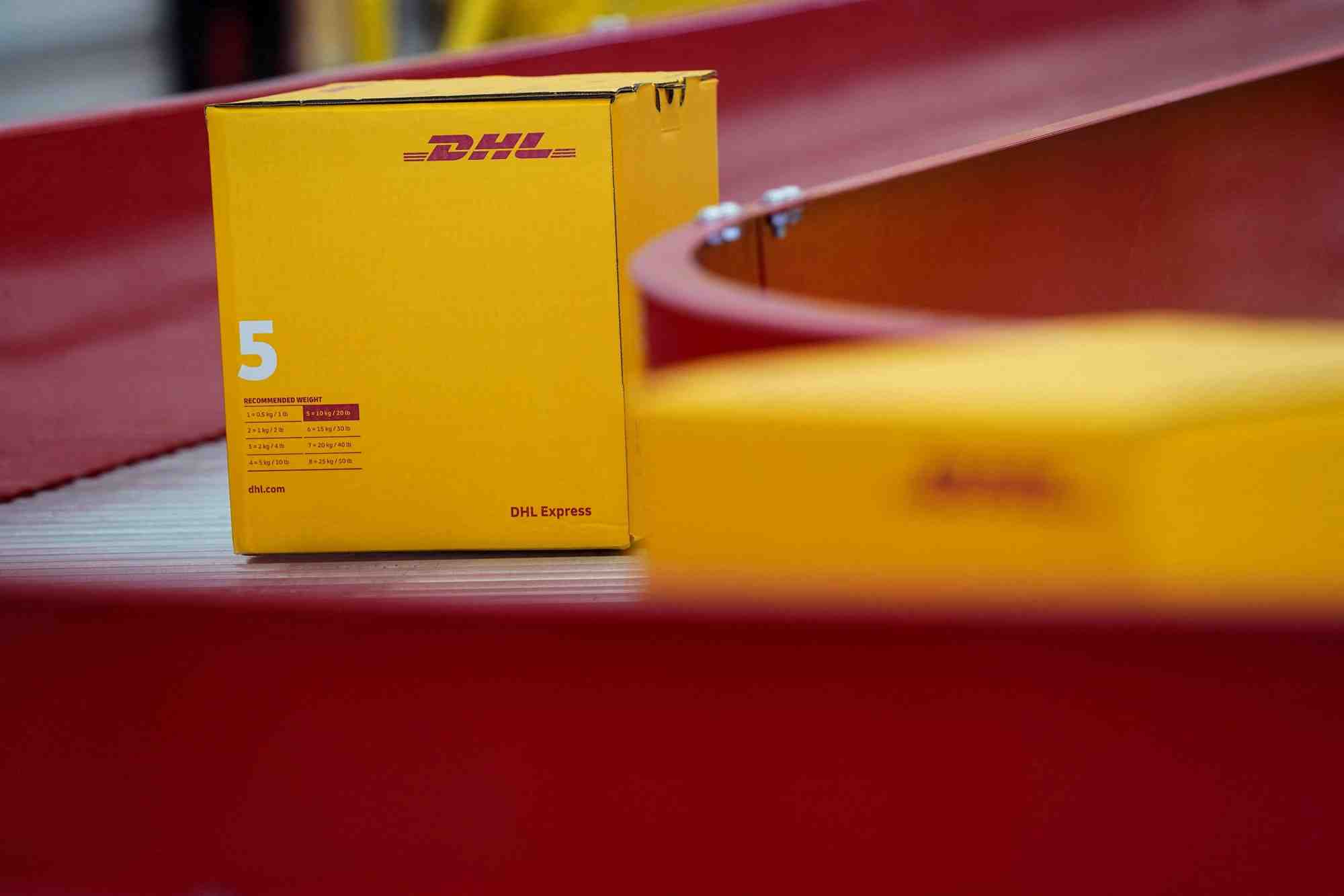 Des boites du groupe postal et logistique allemand deutsche post (dhl) sont exposees lors d'une demonstration