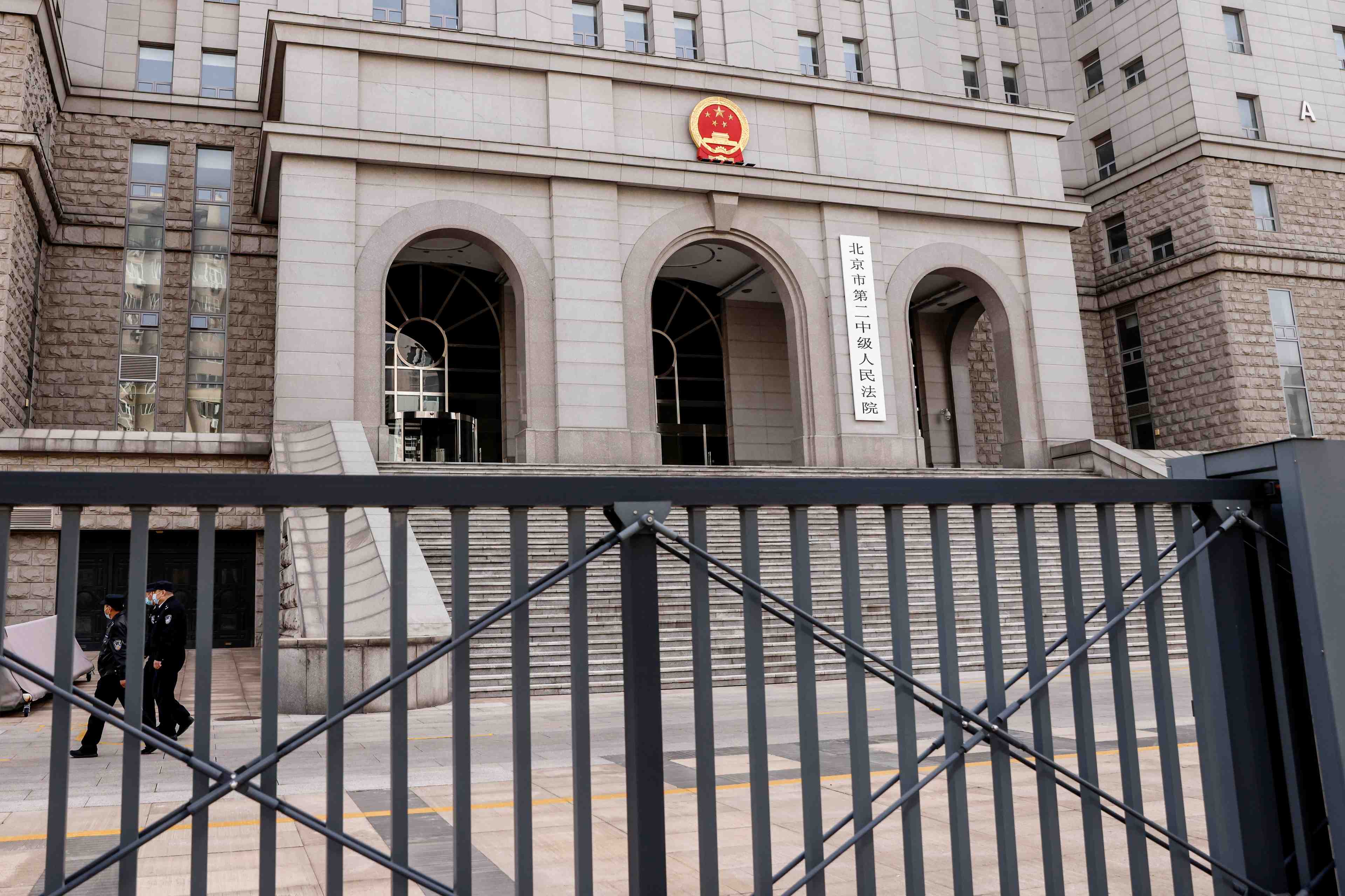 Chine: proces a huis clos a pekin d'un canadien accuse d'espionnage