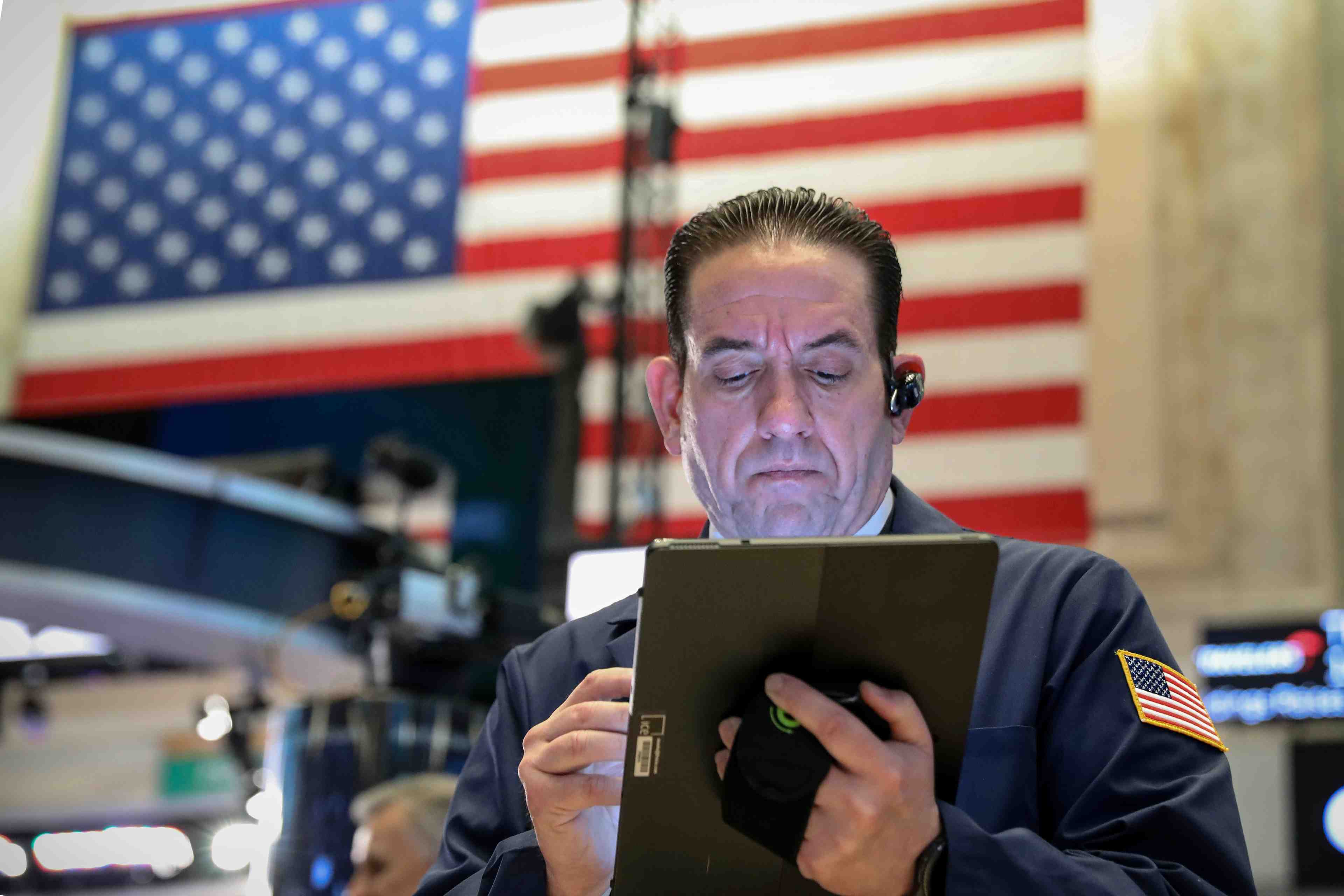 Wall street poursuit son repli face au risque commercial