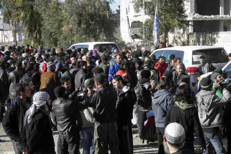 Parmi les évacués de Homs, l'espoir et la crainte