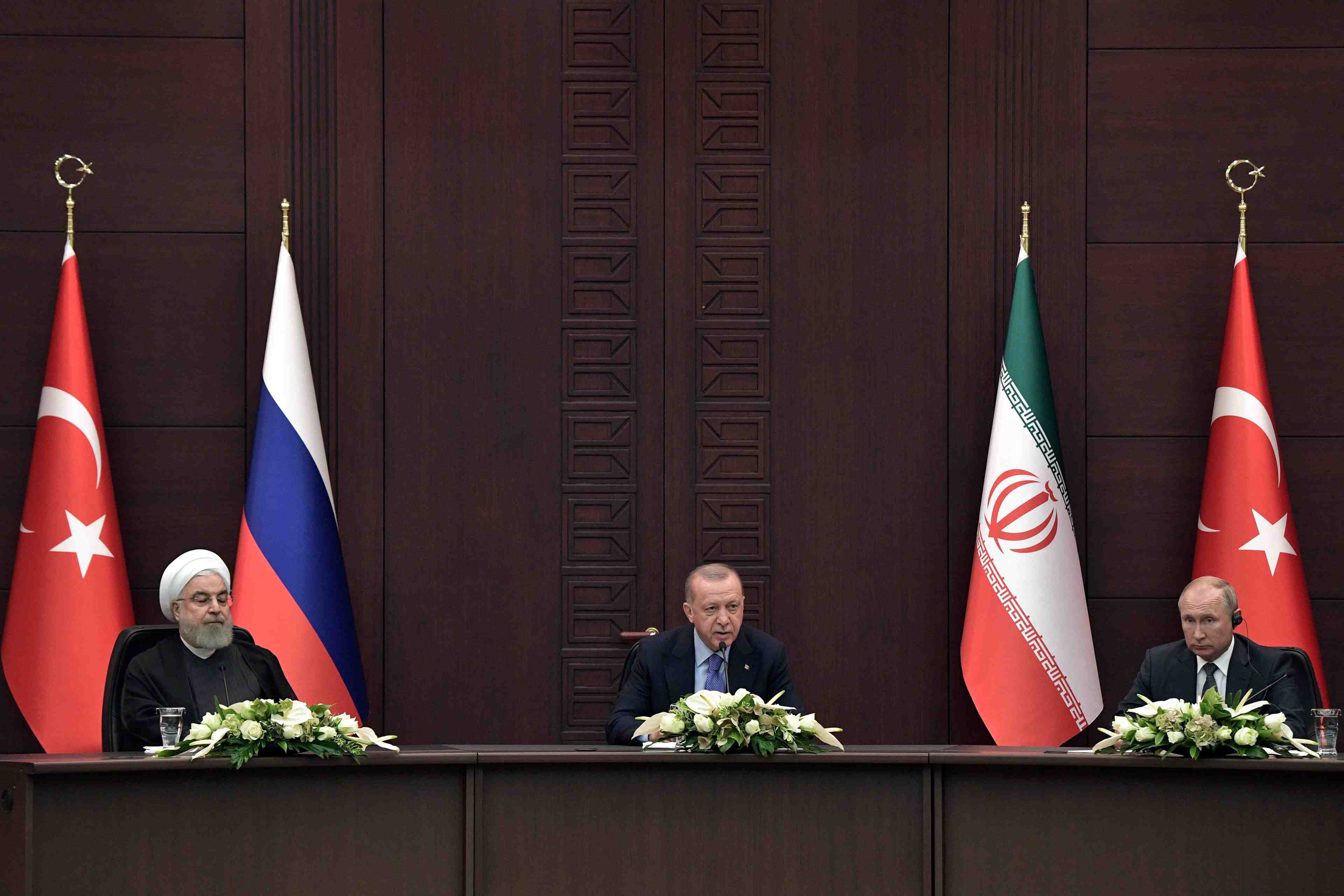 Turquie, iran et russie promettent d'essayer de ramener le calme en syrie