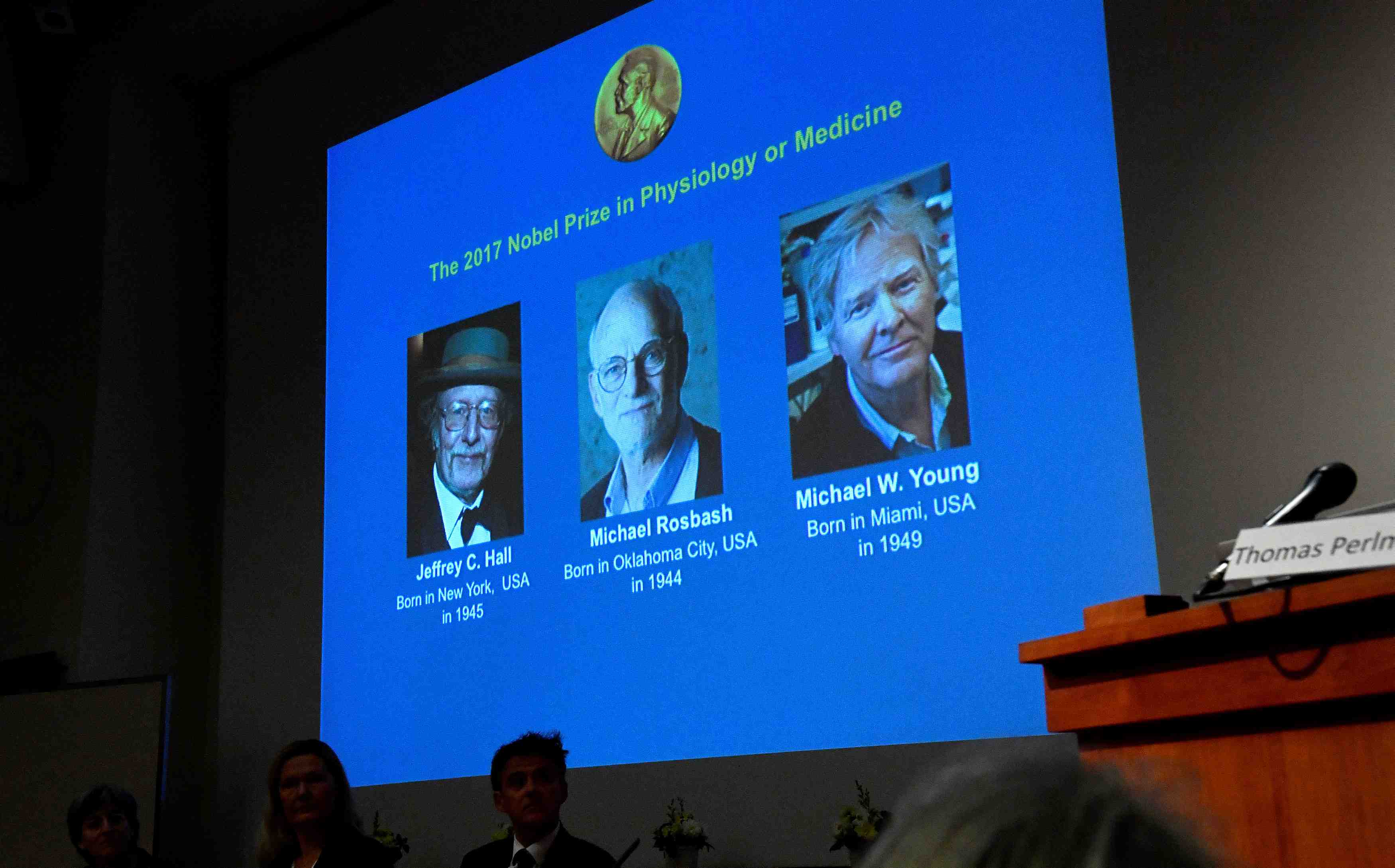 The names of jeffrey c. hall, michael rosbash and michael w. young are displayed during a news conference to announce the winner of the nobel prize in physiology or medicine 2017, in stockholm