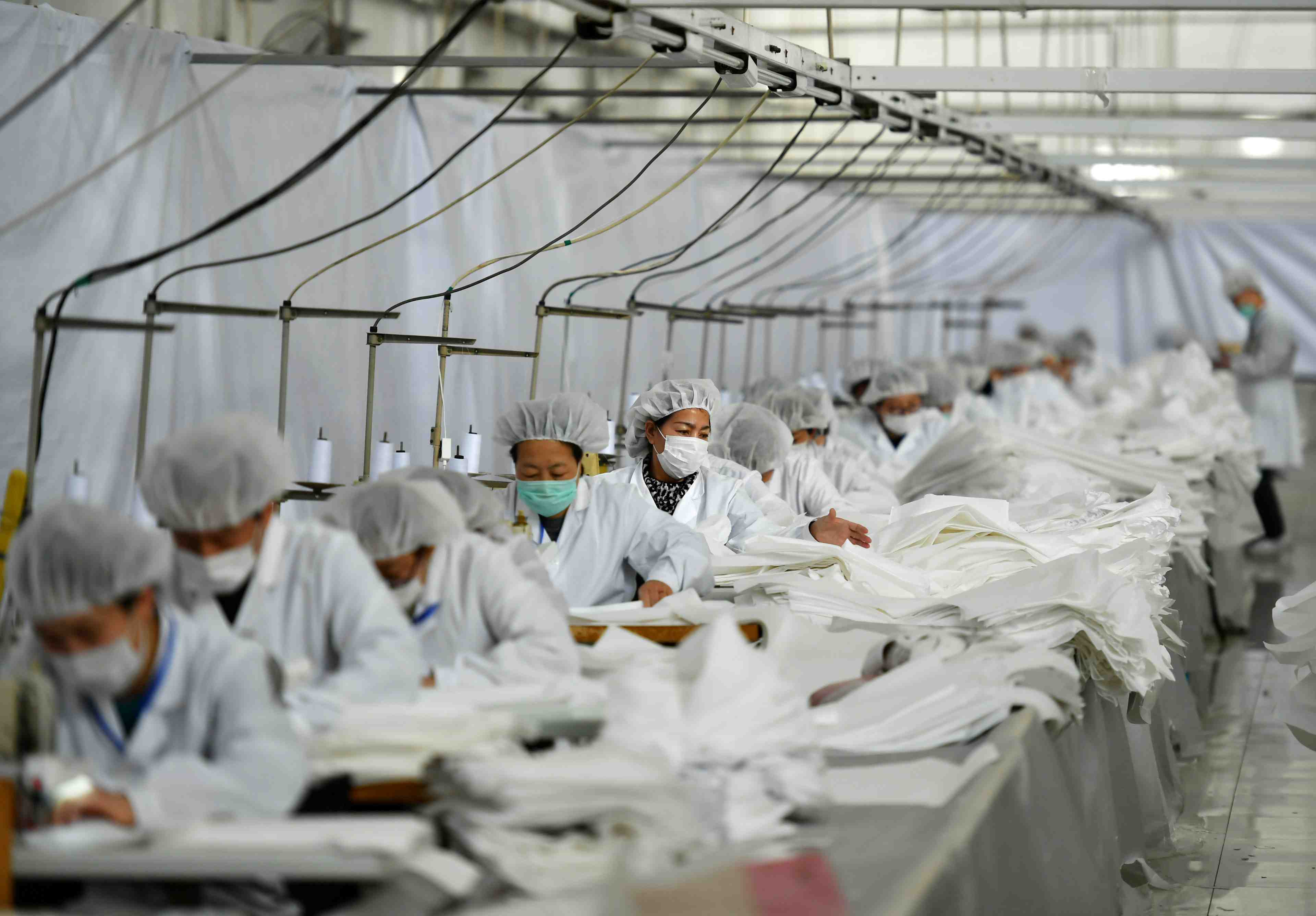 Chine: la progression de l'activite manufacturiere a ralenti, selon caixin