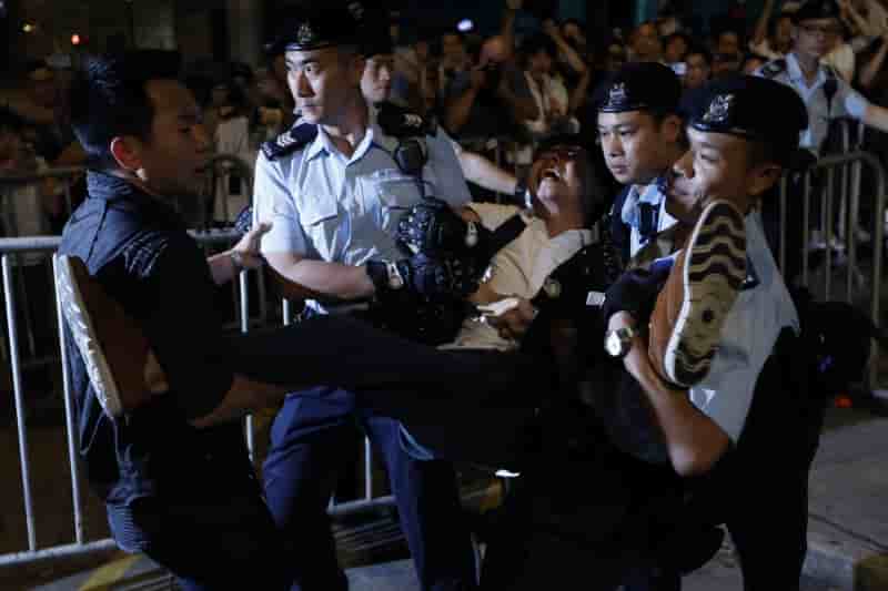 Des opposants arretes a hong kong avant la visite de xi jinping