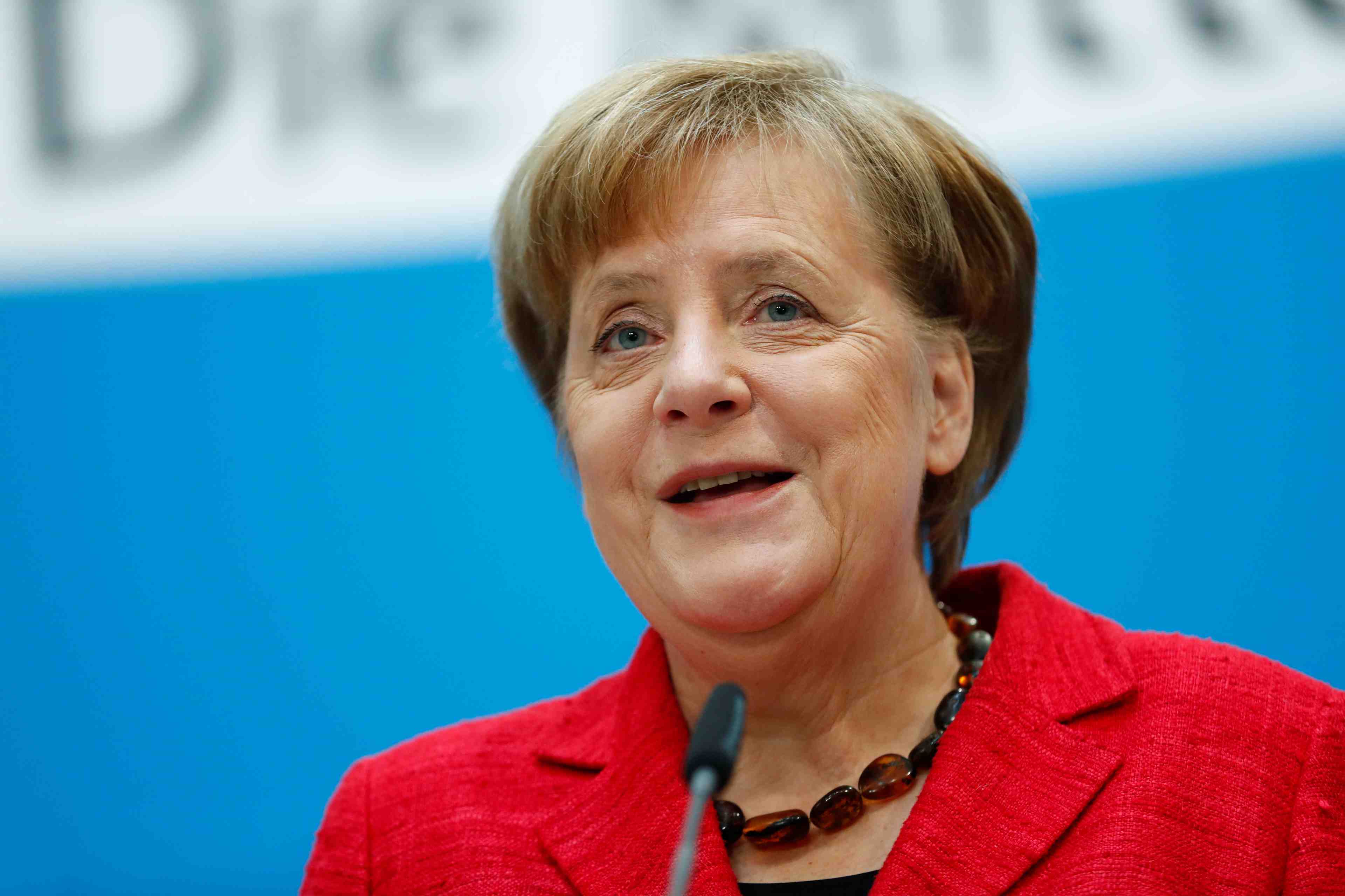 Merkel salue le "oui" du spd et veut un gouvernement sans tarder