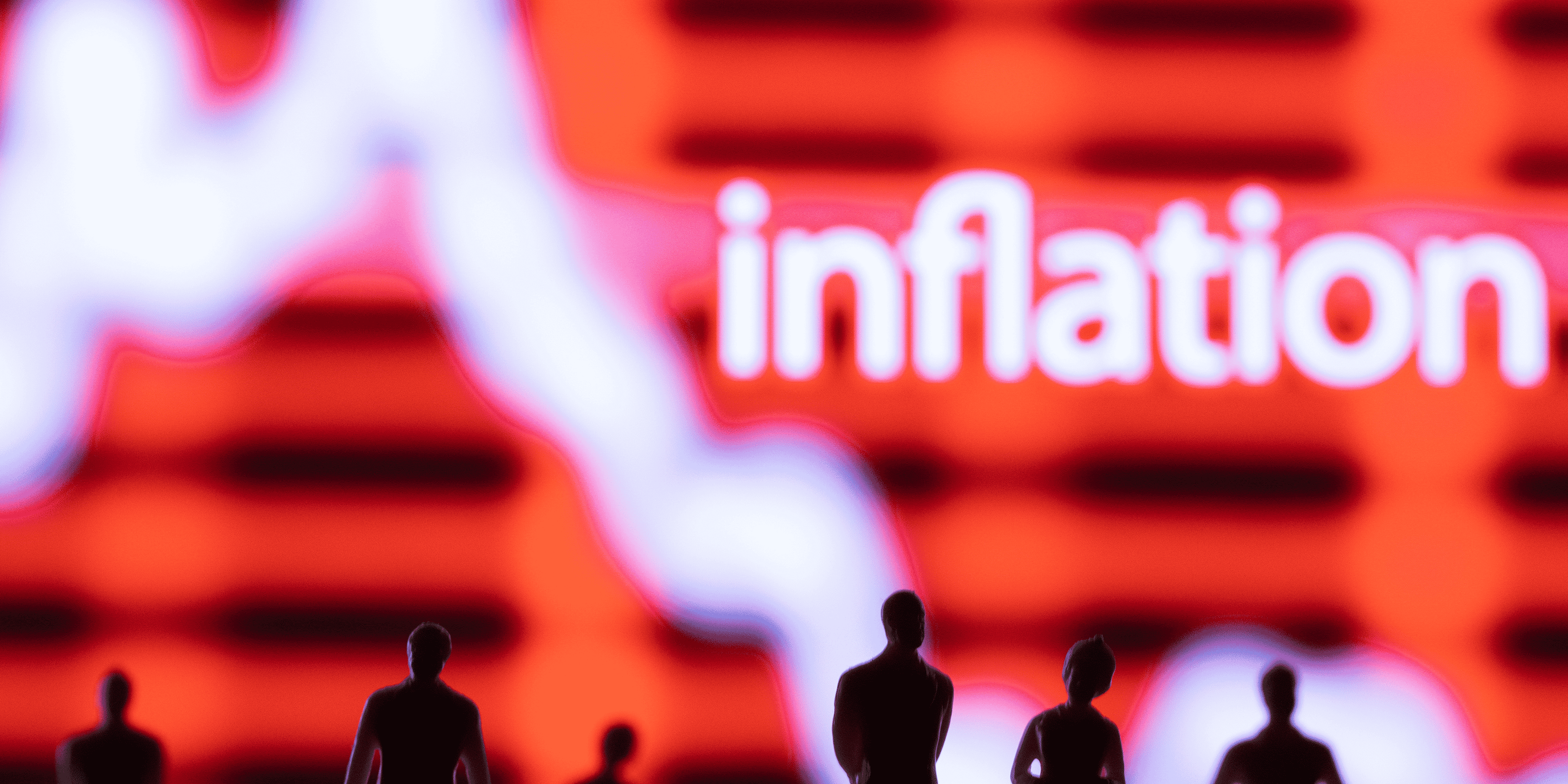 Illustration montre des figurines devant un graphique d'inflation