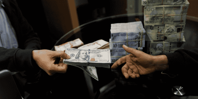dollar dinar change Libye