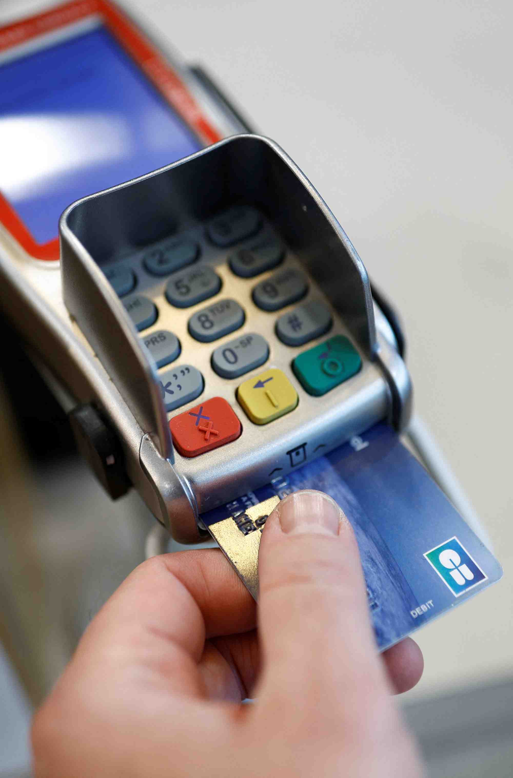 Illustration d'une carte de credit sur un terminal de paiement