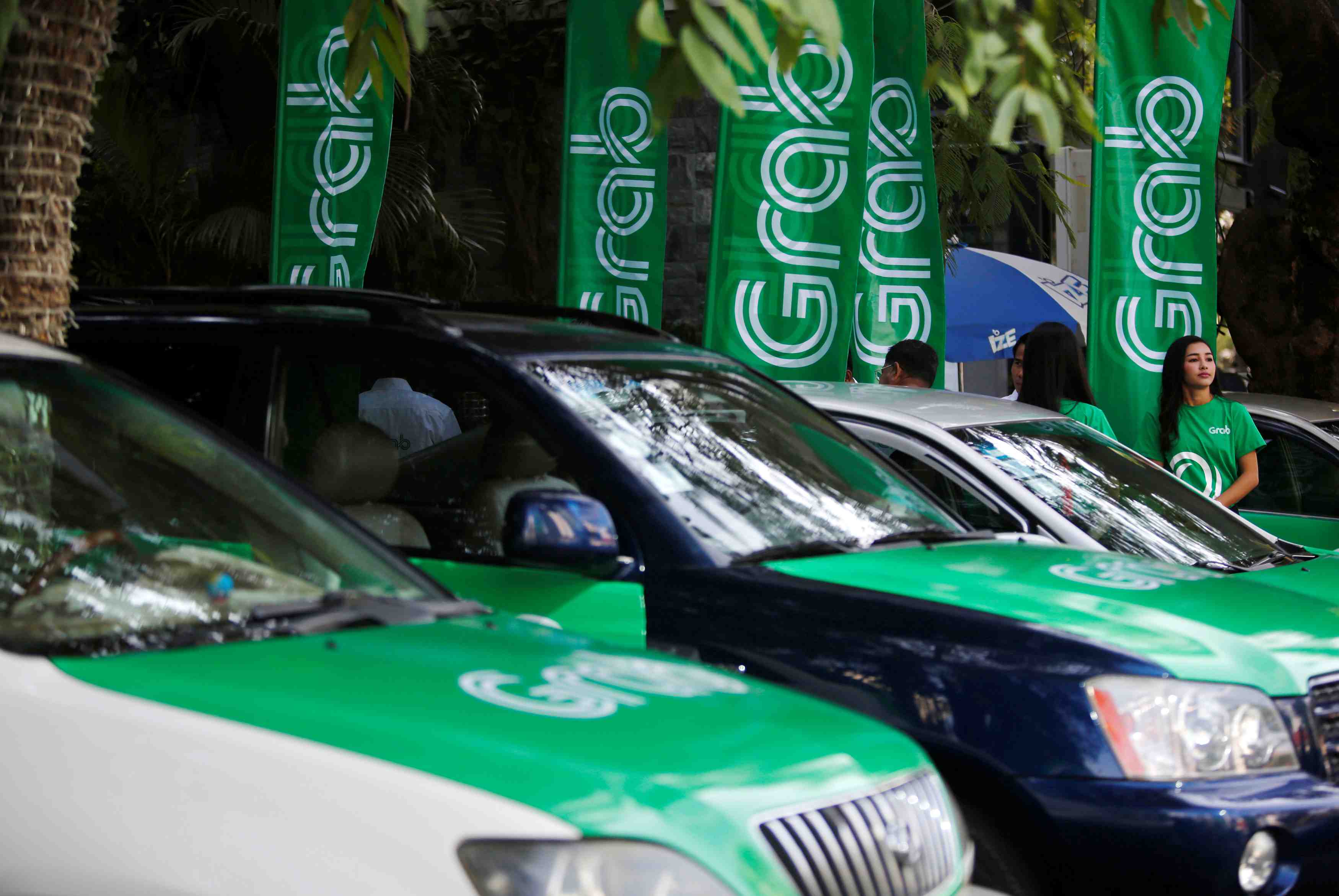 La societe de vtc grab se lance au cambodge apres uber