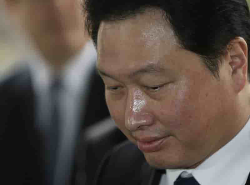 Le patron de sk group interroge par la justice sud-coreenne