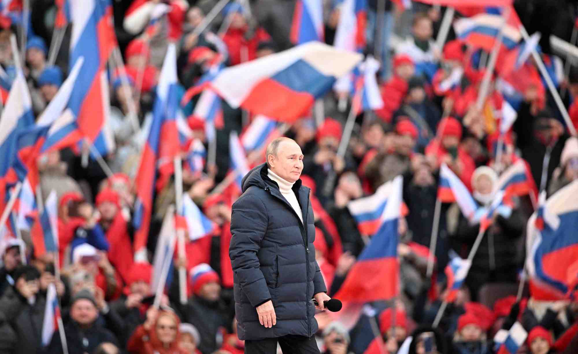 Le president russe vladimir poutine assiste a un concert marquant le huitieme anniversaire de l'annexion de la crimee par la russie, a moscou