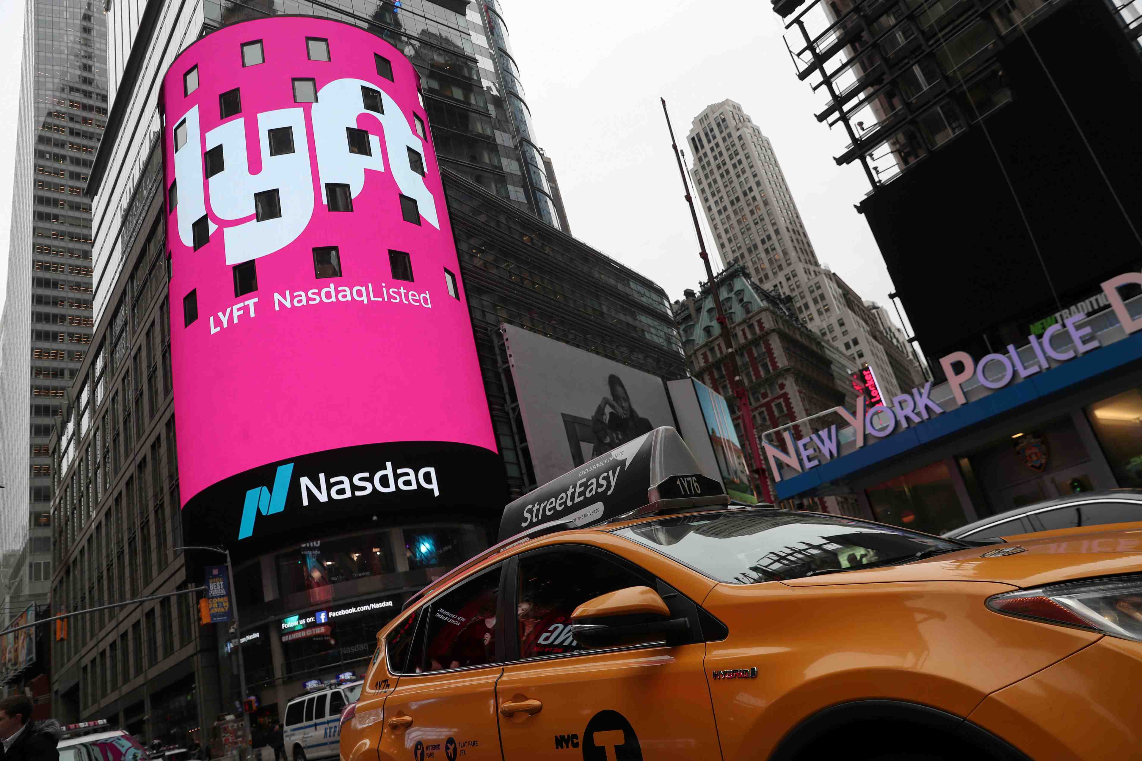 File photo: signage for lyft is seen displayed at the nasdaq marketsite in times square in celebration of its initial public offering (ipo) on the nasdaq stock market in new york