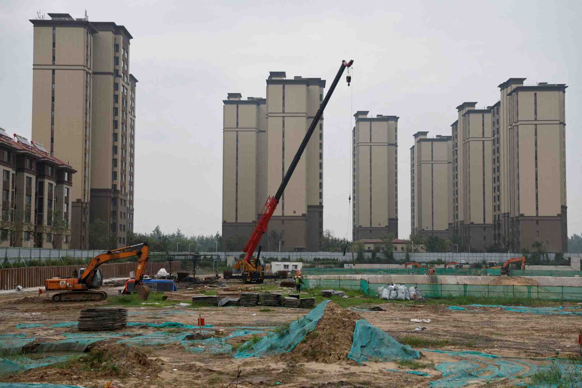L'énorme dette d'Evergrande a contribué à l'aggravation de la crise du marché immobilier en Chine, faisant craindre un temps une contagion mondiale.