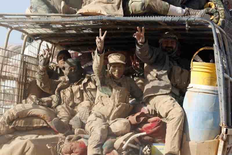 Kurdes et chiites se coordonnent apres l'encerclement de mossoul
