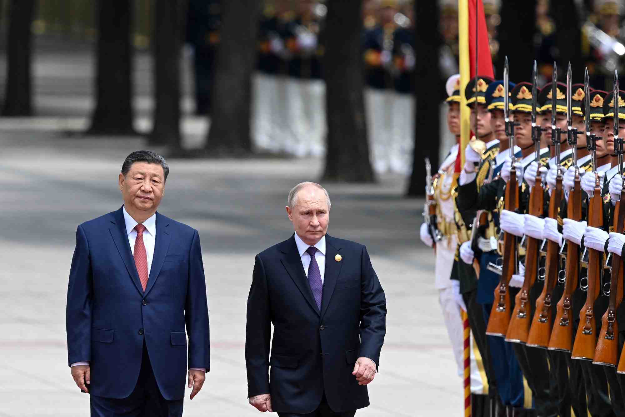 Photo du president chinois xi jinping et son homologue russe vladimir poutine