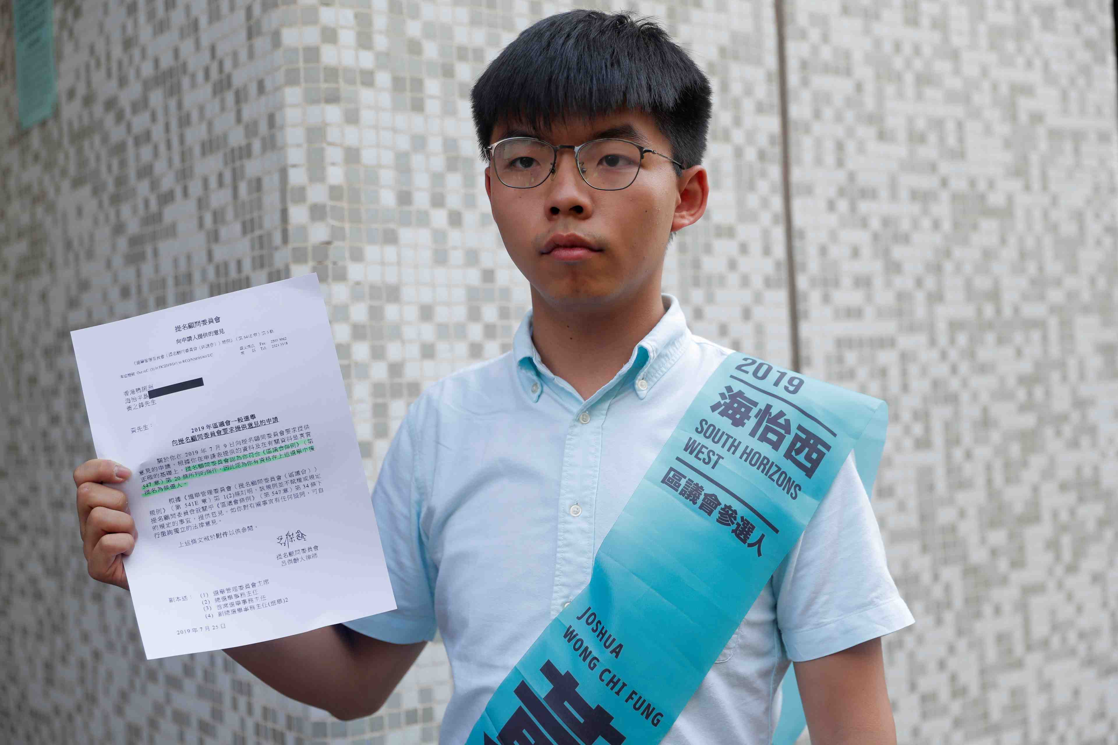 Hong kong: joshua wong interdit a se presenter a une election
