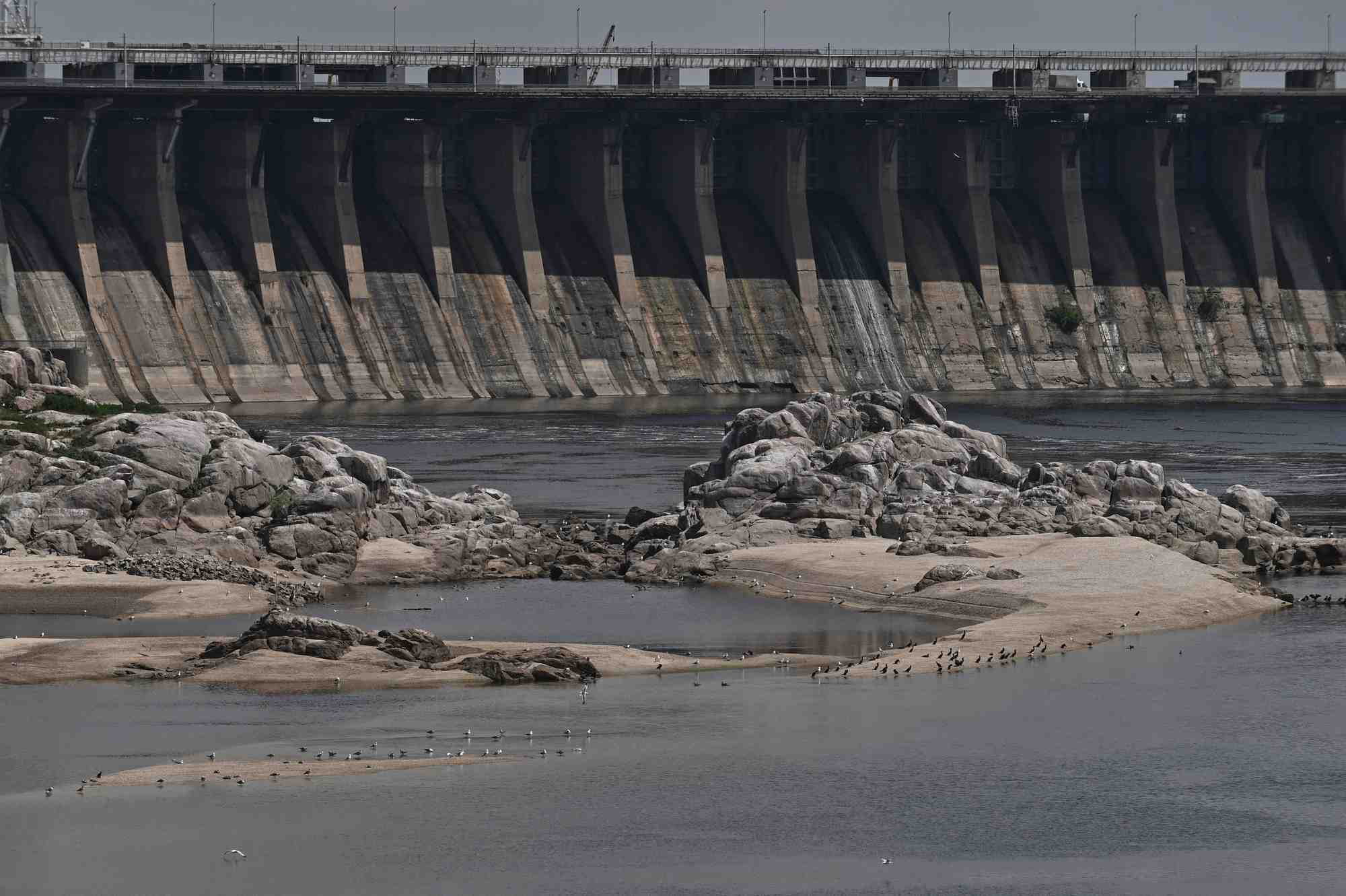 View shows dnipro hydroelectric station and rocky islands which became visible again after water level in the dnipro river sharply dropped following kakhovka dam destruction, in zaporizhzhia