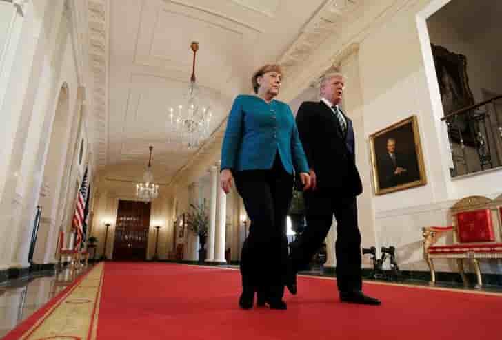 Merkel dit avoir "une bonne relation de travail" avec trump