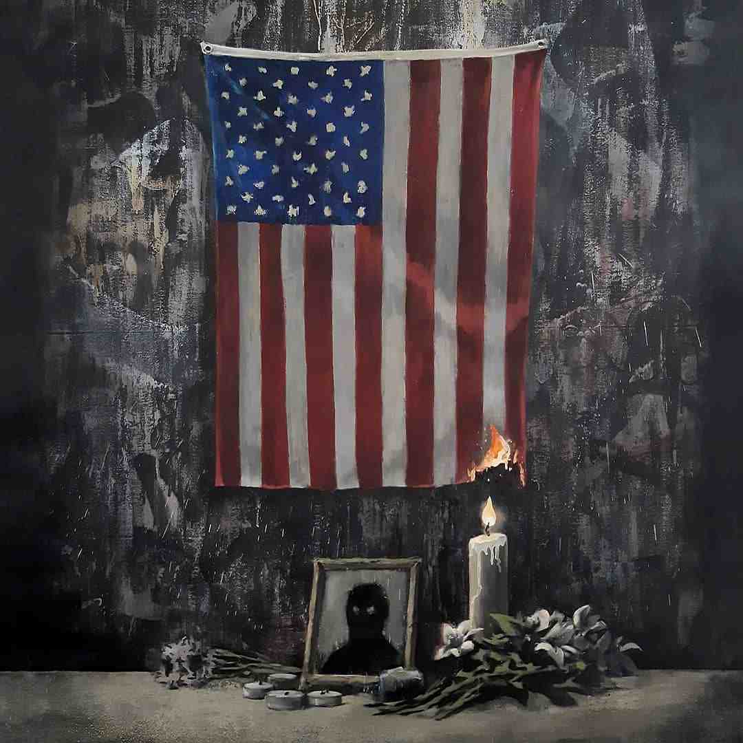 L'artiste banksy illustre le drapeau us prenant feu dans un hommage a george floyd