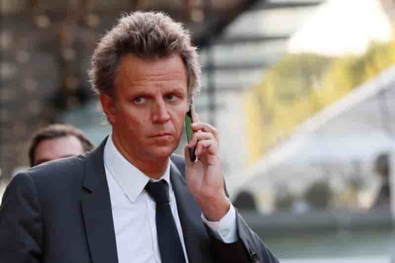 Face a la defiance, publicis promet d'ameliorer revenus et marge