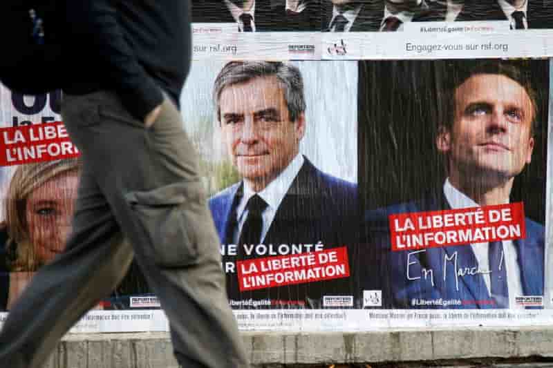 Le duel a distance entre fillon et macron tourne a l'aigre