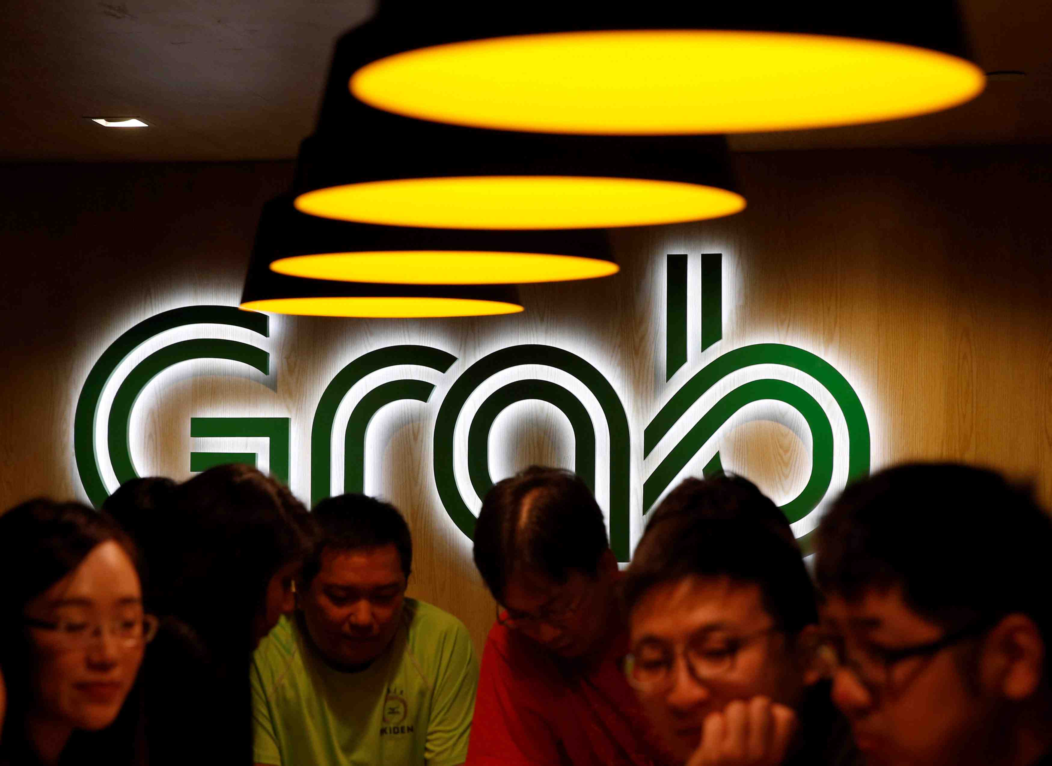 Uber va ceder son activite en asie du sud-est a grab