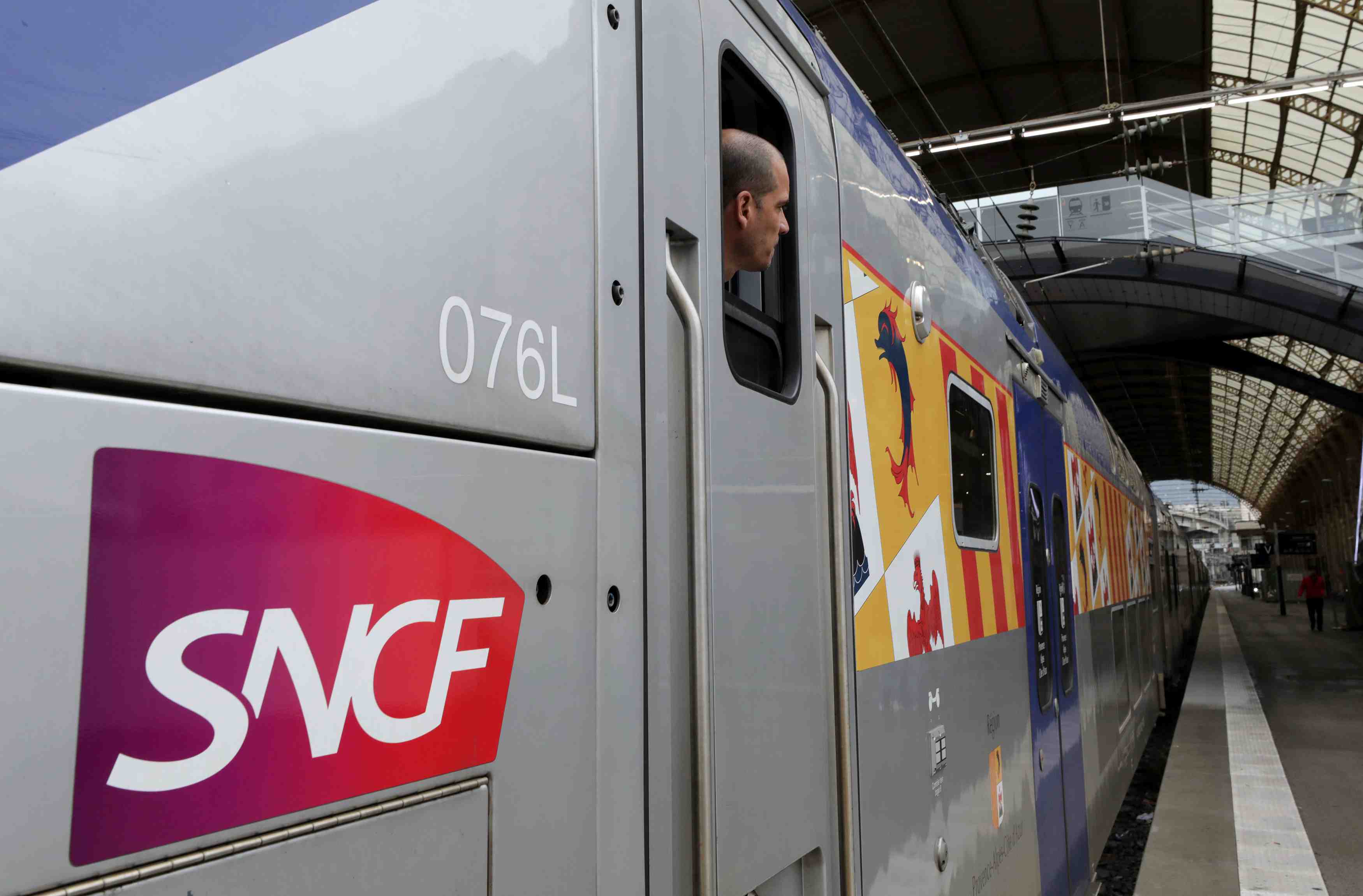 A train conductor is seen at the nice railway station on the second day of a nationwide strike by french sncf railway workers in nice