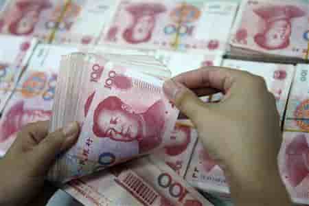 2010-09-17T062609Z_01_APAE68G0HVN00_RTROPTP_3_OFRBS-GEITHNER-YUAN-G20-20100917.JPG
