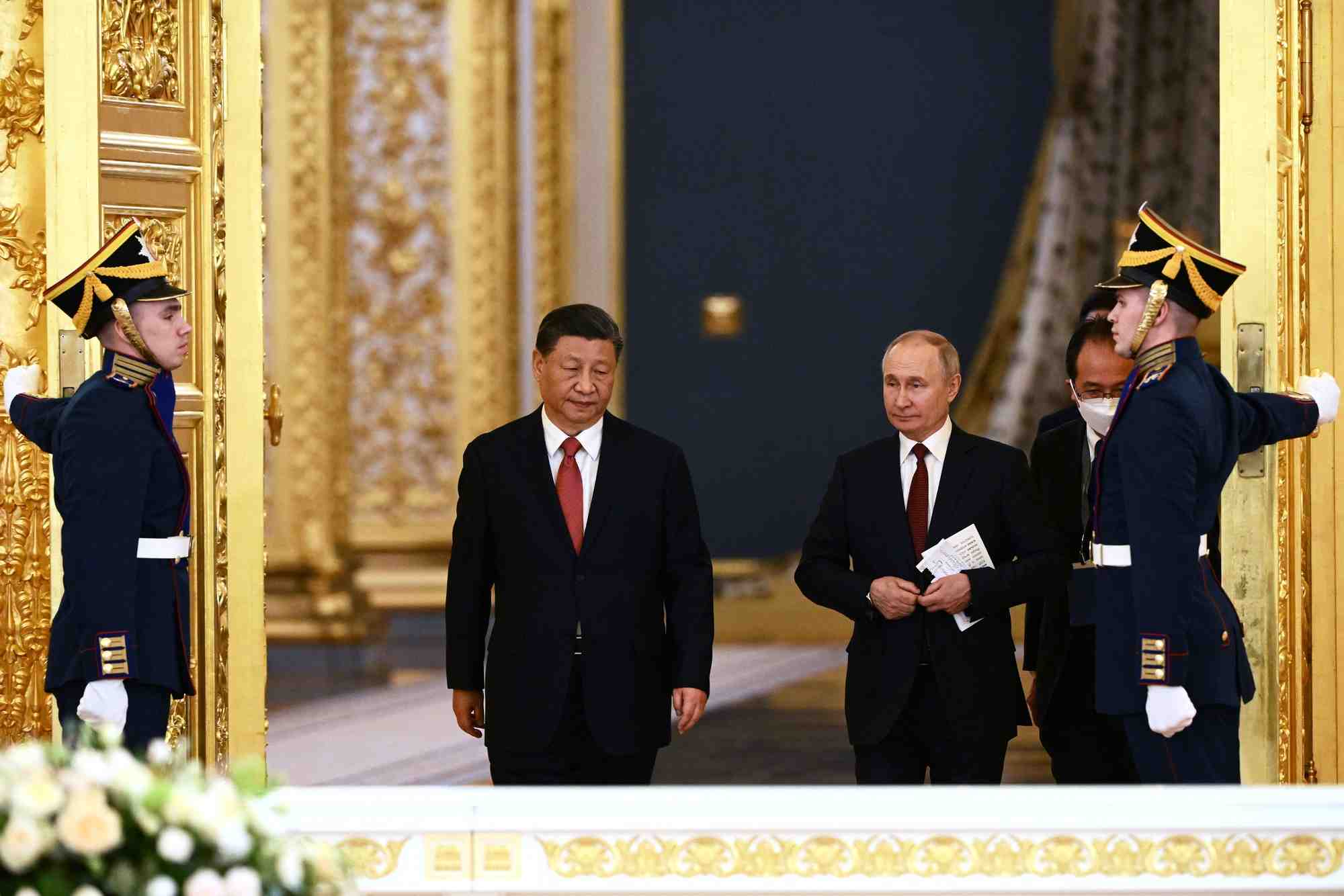 Le president russe poutine s'entretient avec le president chinois xi a moscou